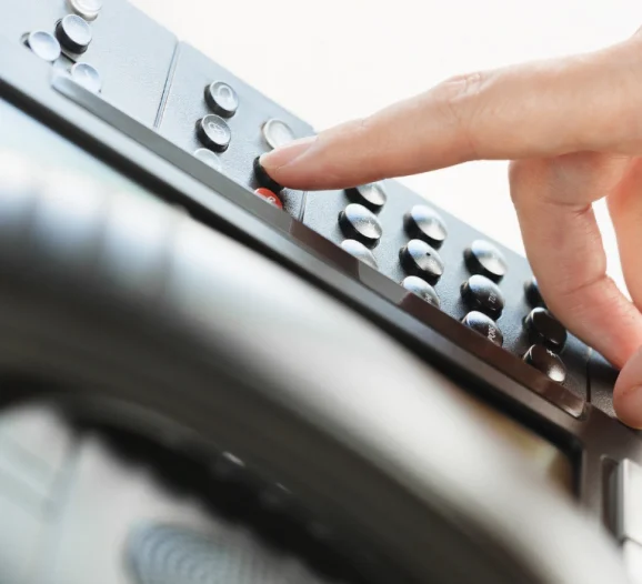 hand using voip phone in the office